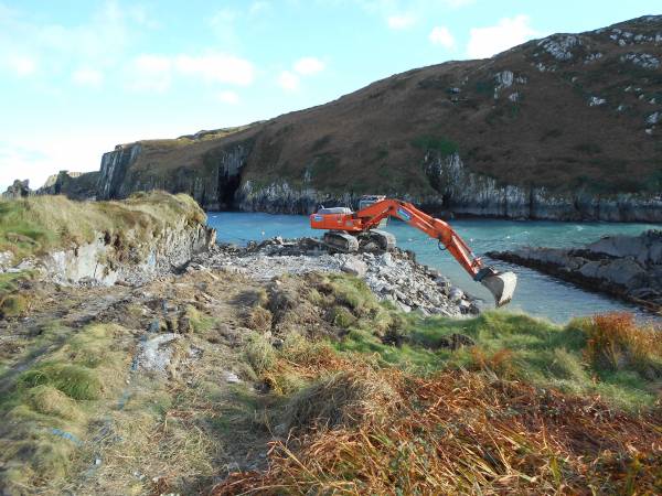 Excavator working on new slip  Cape Clear